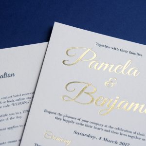Letterpress printed and gold foiled wedding invitation